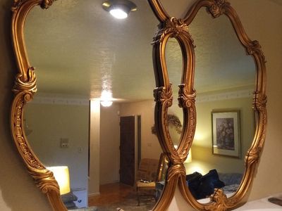 Ornate Gold Framed Wall Mirror with Scalloped Double Frame Design