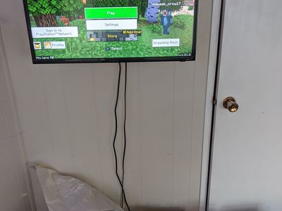 PS 4 with controller and tv
