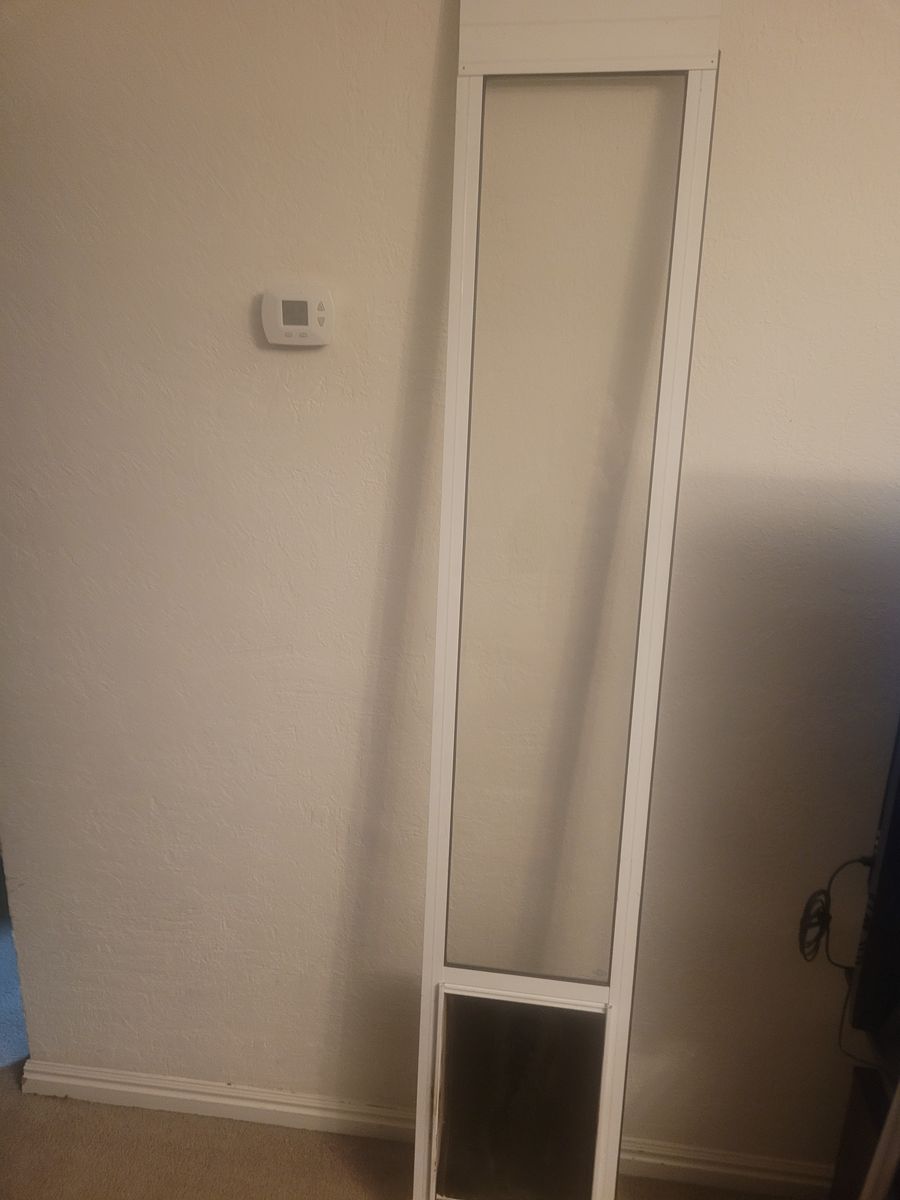 Dog door for sliding glass door