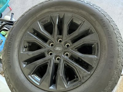OEM Ford 20" Black Wheels with Hankook Dynapro AT2 275/60R20 Tires