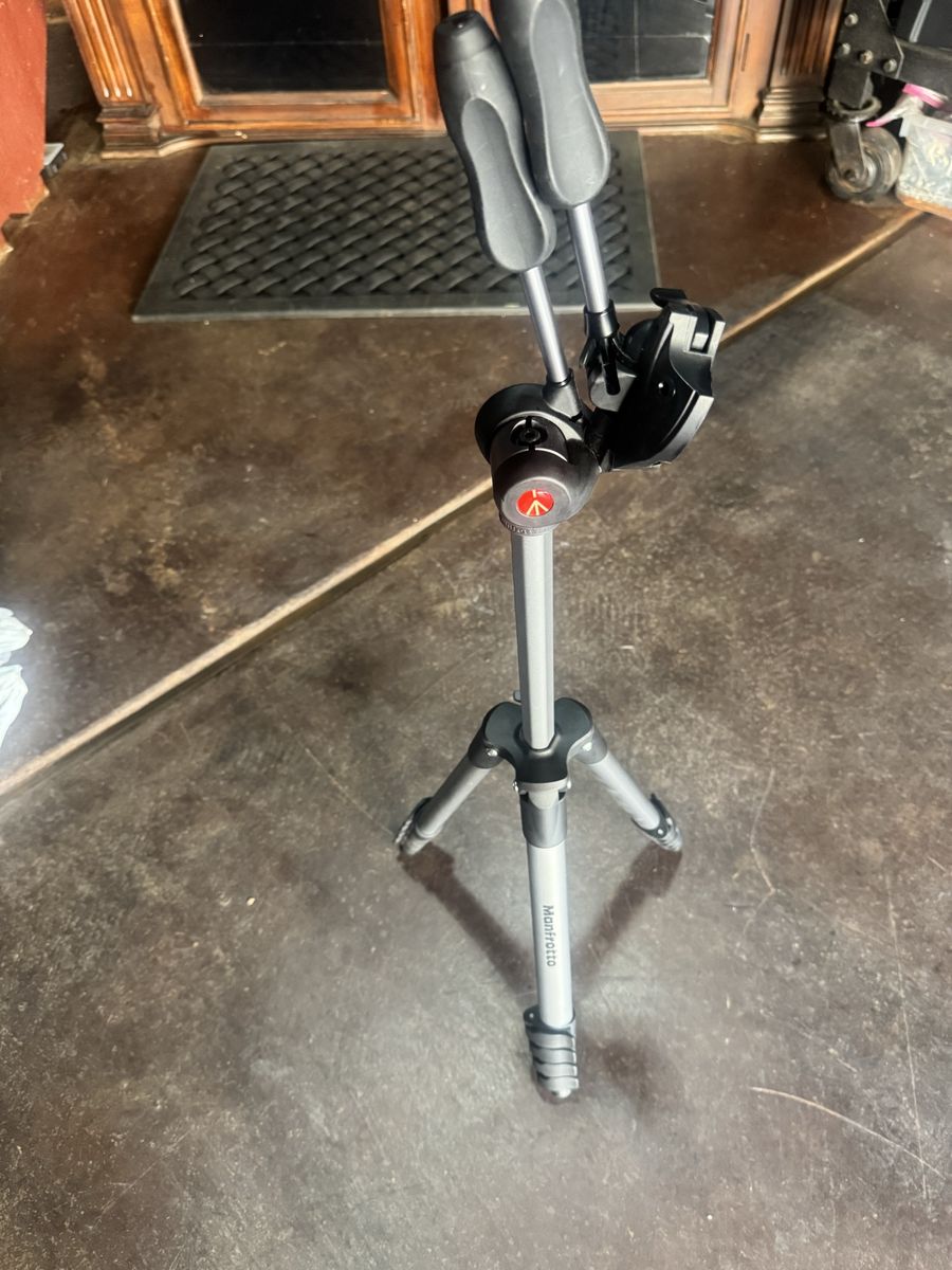 Manfrotto high quality lightweight camera tripod with carry case.