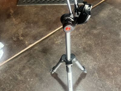 Manfrotto high quality lightweight camera tripod with carry case.