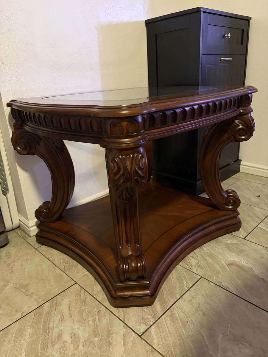 Ornate Wooden End Table with Inset Glass Top and Carved Details