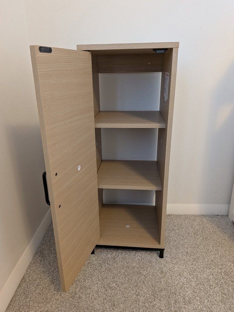 Compact Wood Tone Cabinet.