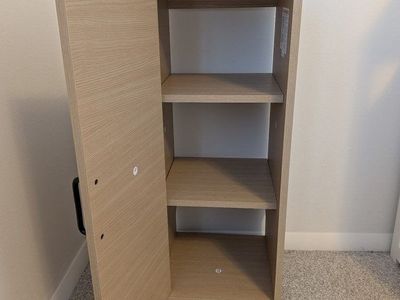 Compact Wood Tone Cabinet.