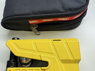 ABUS Granit Detecto 8077 Yellow Motorcycle Disc Lock with built-in Alarm and Case and Keys