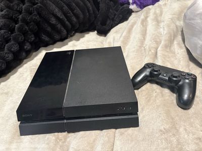 Sony PlayStation 4 (PS4) 500GB Console with DualShock 4 Controller - Black