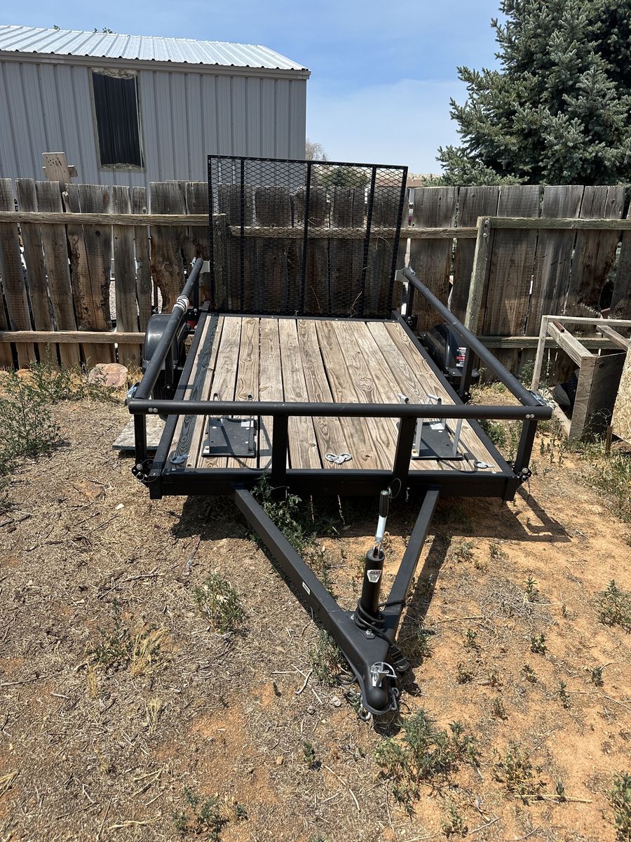 Karavan flat bed trailer 5.5x9