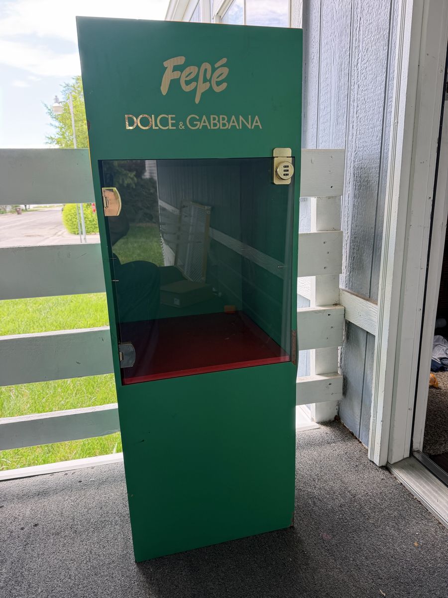 Locked Dolce and Gabbana perfume display