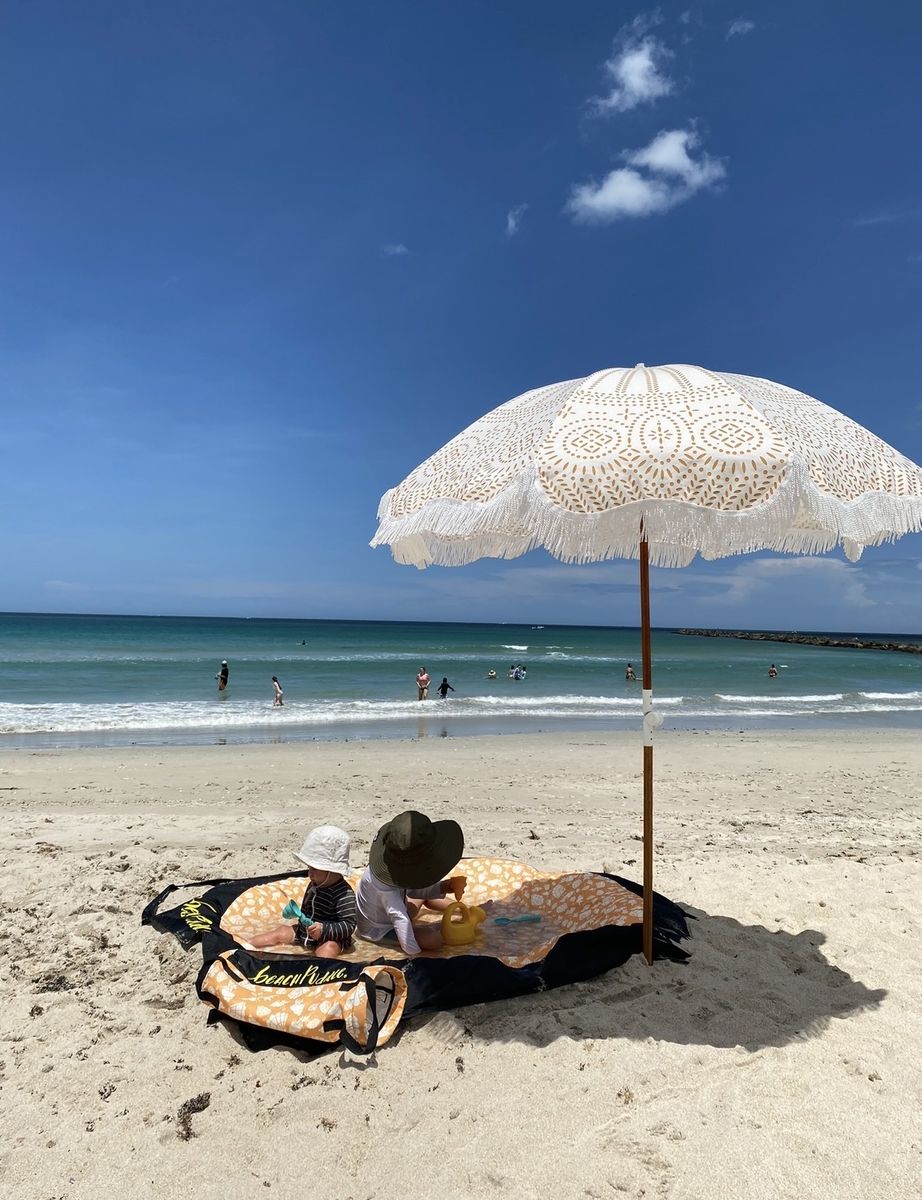 Business and pleasure beach umbrella