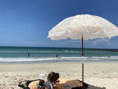 Business and pleasure beach umbrella