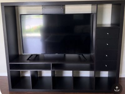 Black entertainment center TV
