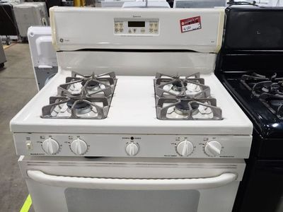 NICE GE 4 BURNER GAS RANGE! W-WARRANTY
