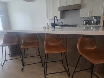 Set of 4 Modern Brown Faux Leather Bar Stools with Black Metal Legs - Counter Height Seating