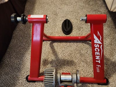 Ascent fluid bike trainer