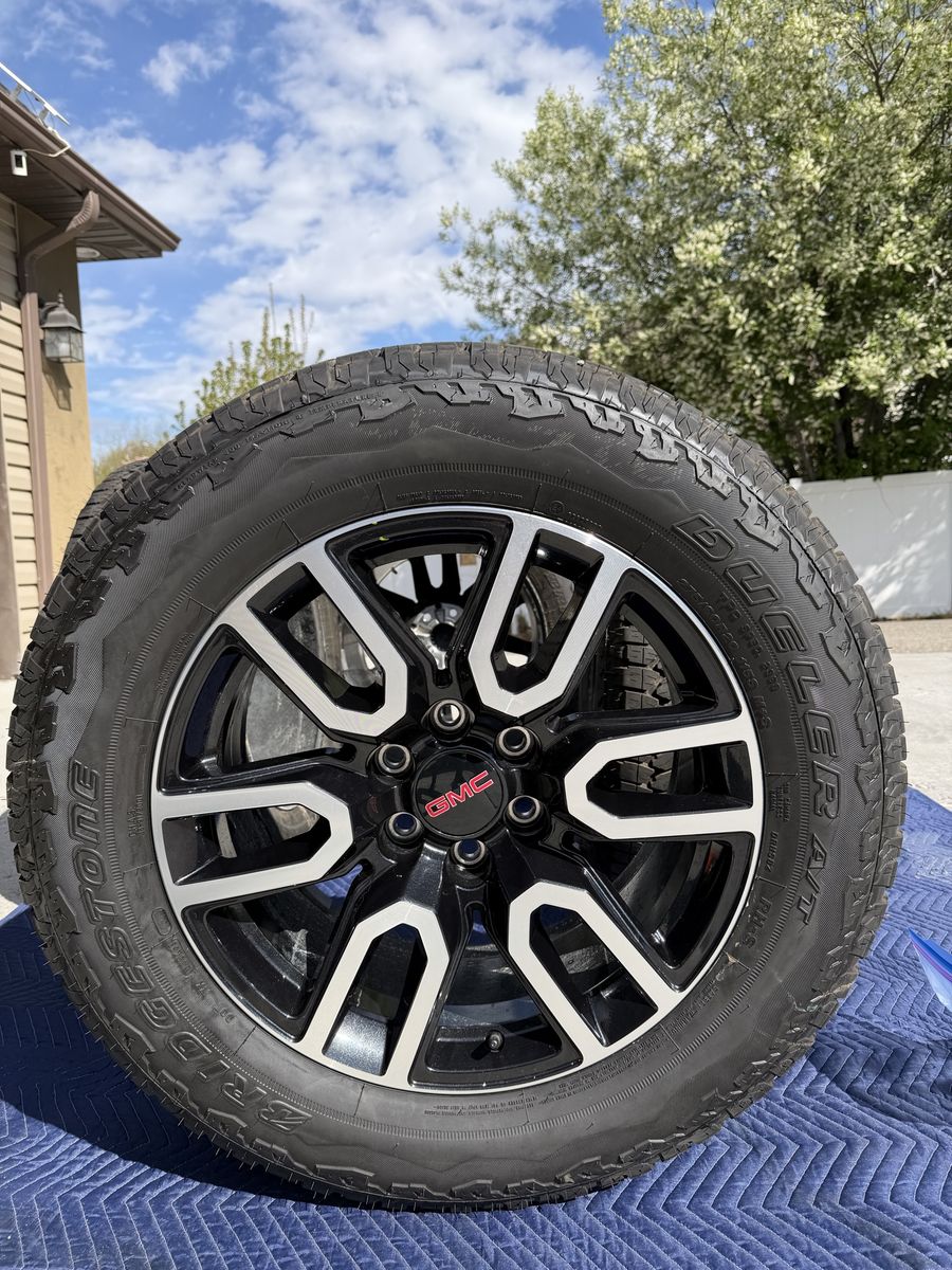 275/60 R20 tires mounted in 20” GMC wheels