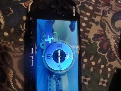 PSP 3000 console, Black, with 6 games in hard case,