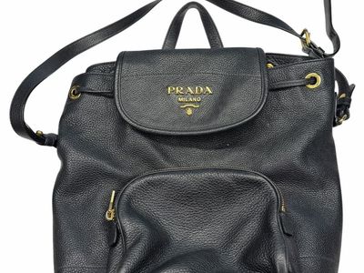 Prada Black Vitello Daino Leather Backpack Gold Hardware Drawstring Flap Closure