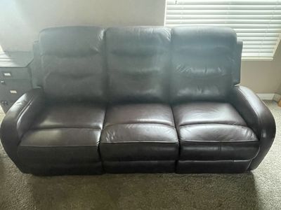 Leather recliner (2) couch. 3 seats two of which recline.