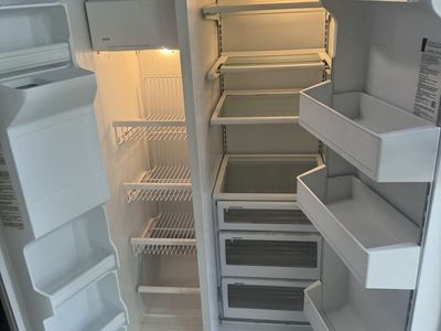 GE Profile White Side-by-Side Refrigerator works great its plug in for u to see $100