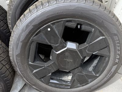Bridgestone Blizzak tires on Kia rims. 235/55R19