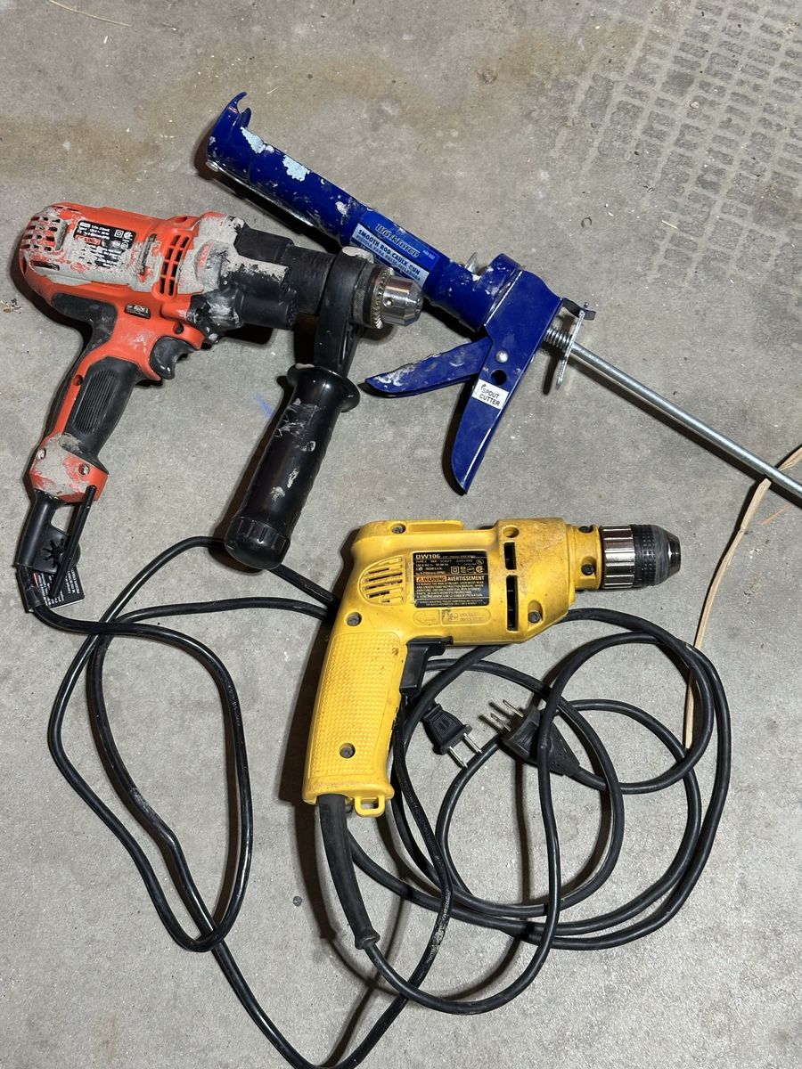 Power Drills And Caulking Gun