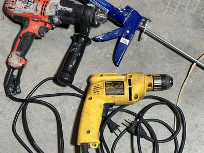 Power Drills And Caulking Gun