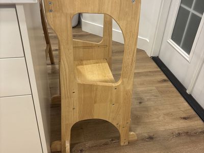 Kid standing tower