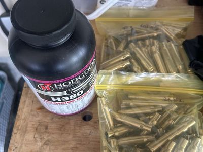Hodgdon H380 Reloading Powder, Hornady 30 CAL 180 gr SST Bullets, and Pittsburgh Digital Caliper