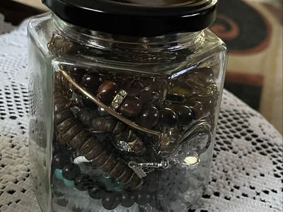 Assorted Jewelry Collection: Bracelets, Necklaces, Rings earrings in Glass Jar