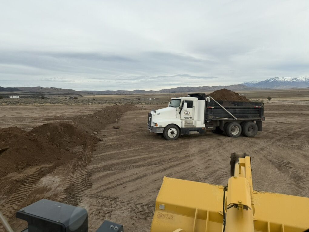 Dump Truck And Loader For Hire