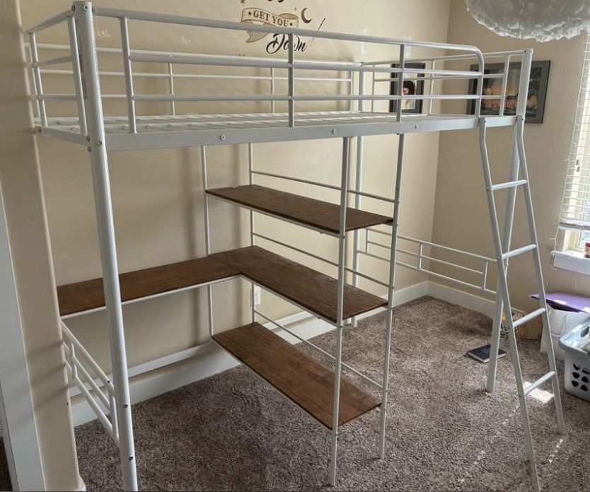 White loft bed with shelving, desk, and ladder