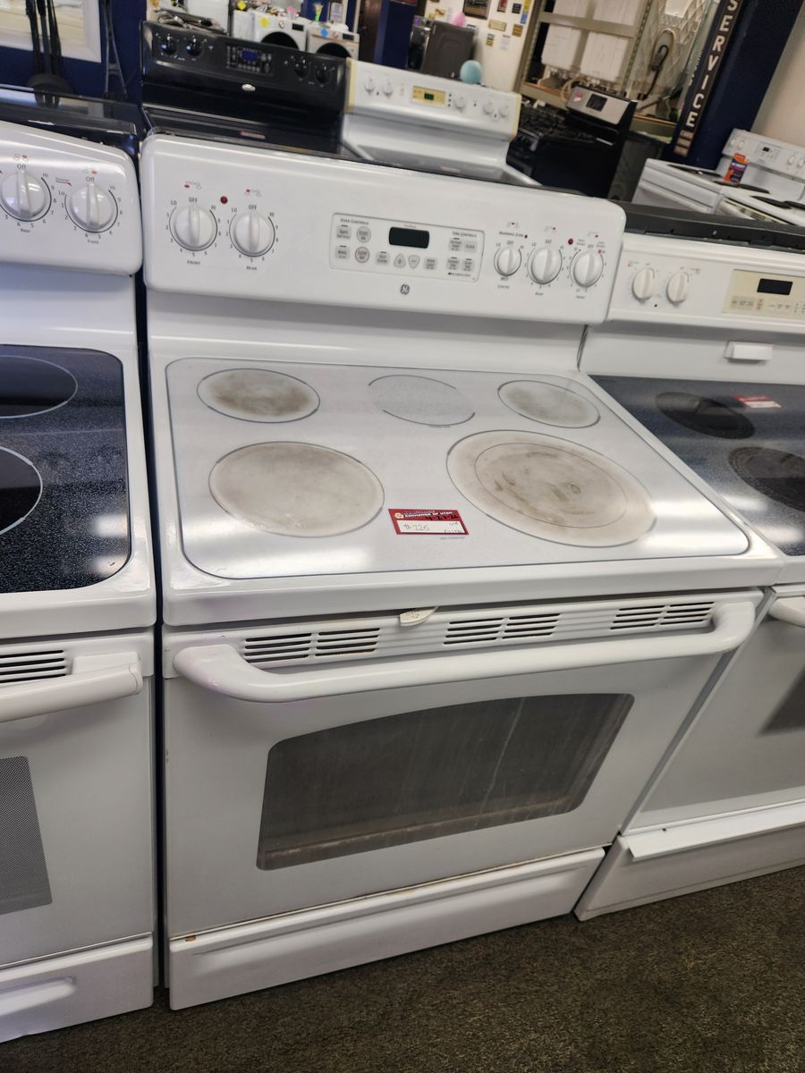 LOW PRICE GUARANTEED! GE WHITE GLASS TOP RANGE