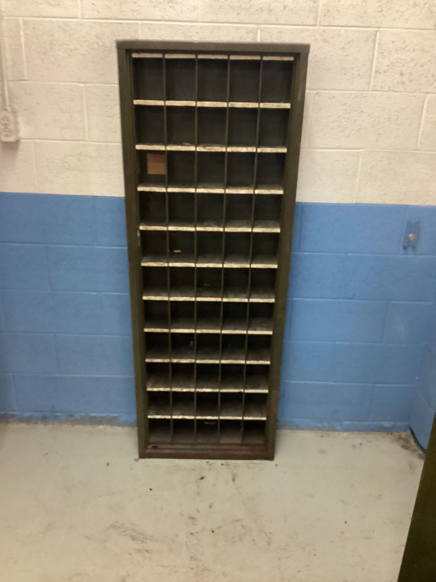 Tall metal parts cabinet