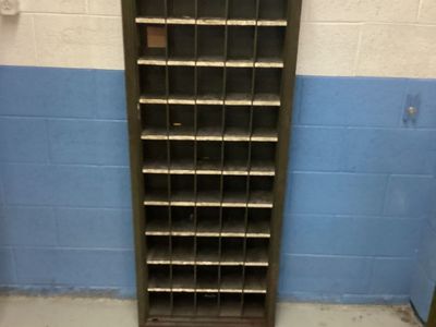 Tall metal parts cabinet