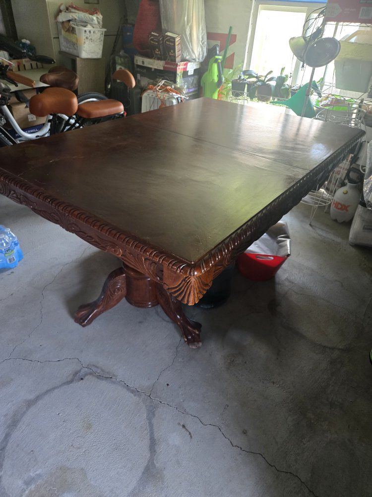 Traditional Carved Wood Pedestal Dining Table with Claw Feet