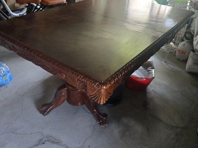 Traditional Carved Wood Pedestal Dining Table with Claw Feet