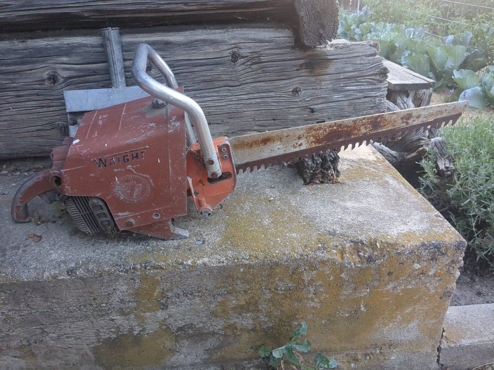 Vintage Wright Chainsaw - Classic Saw Machine, Collectible Power Tool, Red/Silver