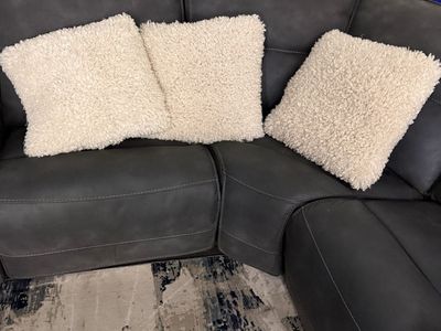 Three white throw pillows I think they’re 12“ x 12“