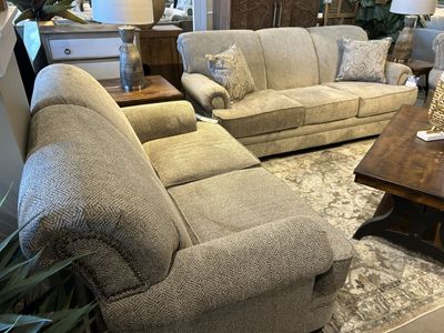 Stylish Tan Herringbone Sectional Sofa with Nailhead Trim and Decorative Pillows