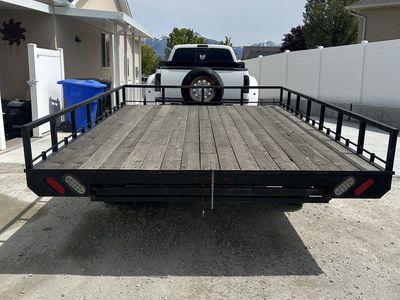 Utility flat bed trailer