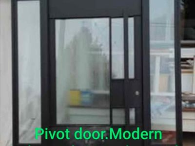 Modern Industrial Pivot Door 95"W x 103"H
w/ Double Pane Rain & Regular Glass
