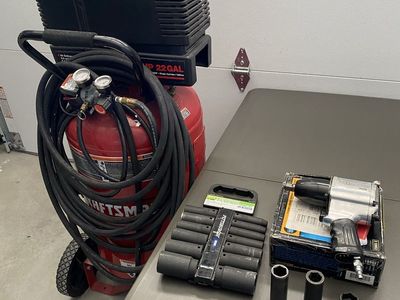 Craftsman 22-Gallon Air Compressor with Impact Wrench & Socket Set - above average condition.