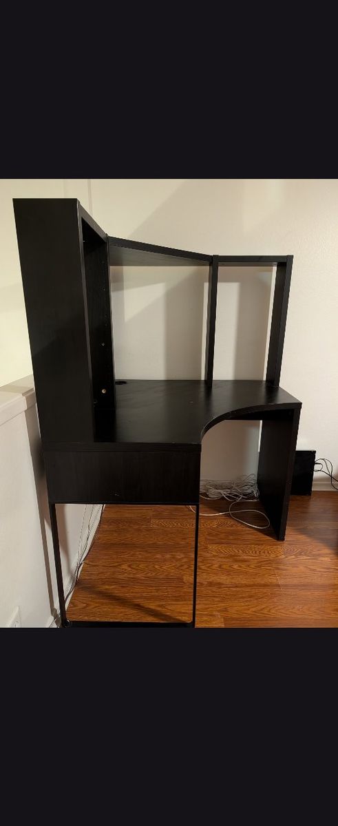 Black IKEA MICKE Corner Desk