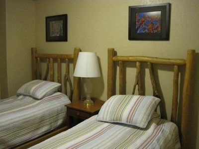 Pair of Twin Log Beds with bedding
