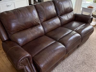 Brown leather reclining couches