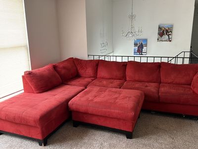 Freshly cleaned red sectional - delivery available