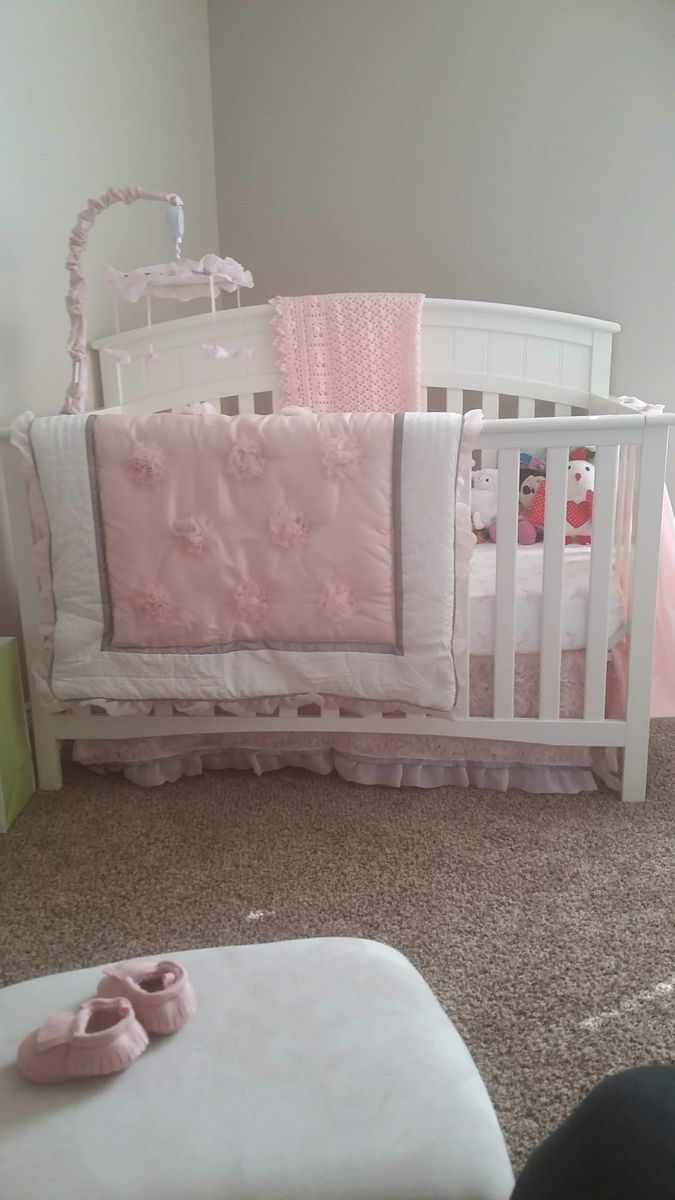 Crib, mattress, 2 x sheet waterproof mattress protectors, 4 x mattress sheets, blanket, and crib skirt