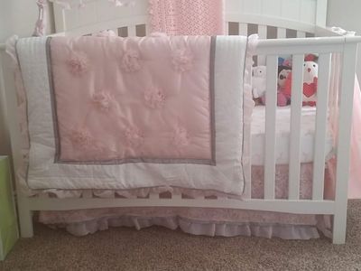 Crib, mattress, 2 x sheet waterproof mattress protectors, 4 x mattress sheets, blanket, and crib skirt