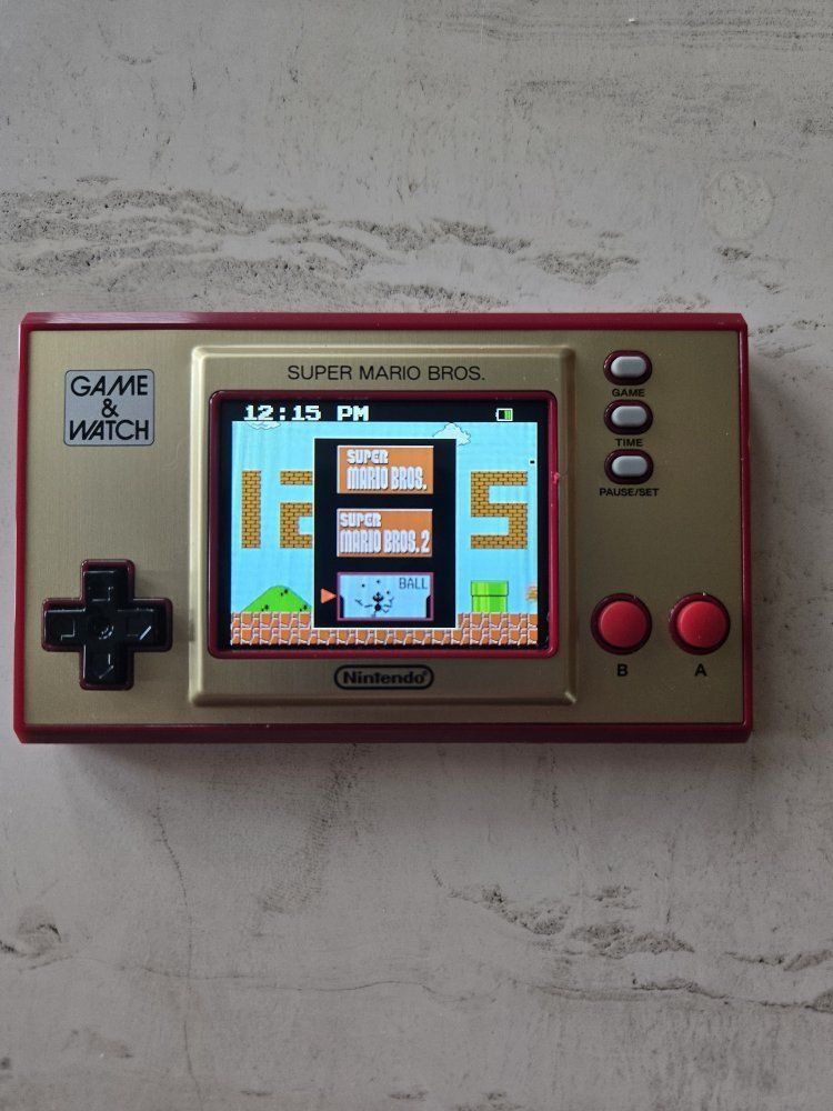 Nintendo Game & Watch Super Mario Bros Handheld Electronic Game 3 games in 1 like new